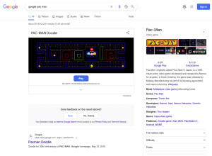 Play Pacman Game by Google - elgooG